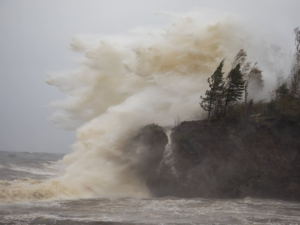 A massive wave pounding the shore along Lake Michigan, 2018. 
